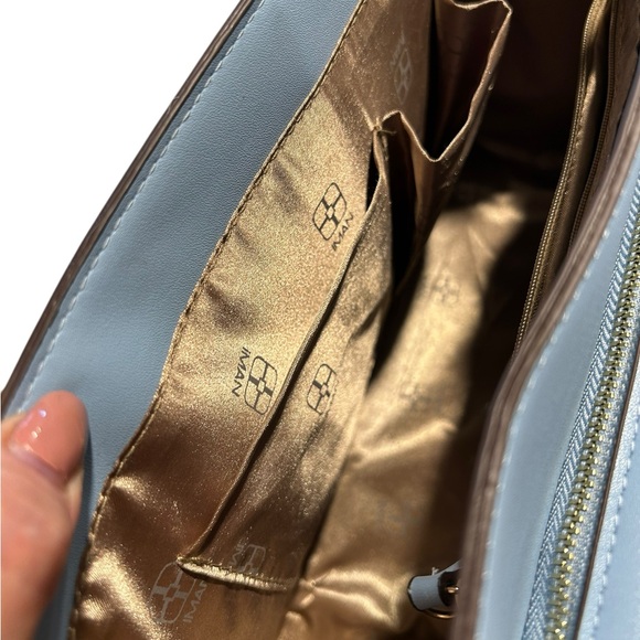 IMAN Global Chic convertible flap handbag with a floral design on the flap - Picture 10 of 14